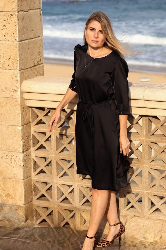 Black satin dress with button